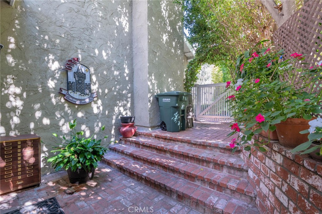 24945 Valley Rim Terrace Lake Forest, CA 92630 - Photo 44 of 52 a backyard of a house with flower plants