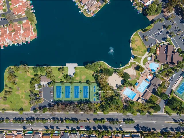 an aerial view of a swimming pool and outdoor space