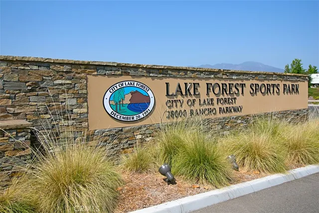 an aerial view of a house with a table and chairs