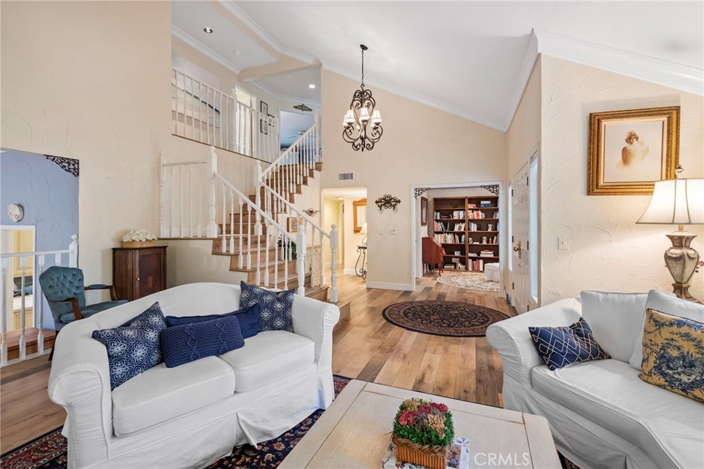 24945 Valley Rim Terrace Lake Forest, CA 92630 - Photo 5 of 52 a living room with furniture and wooden floor