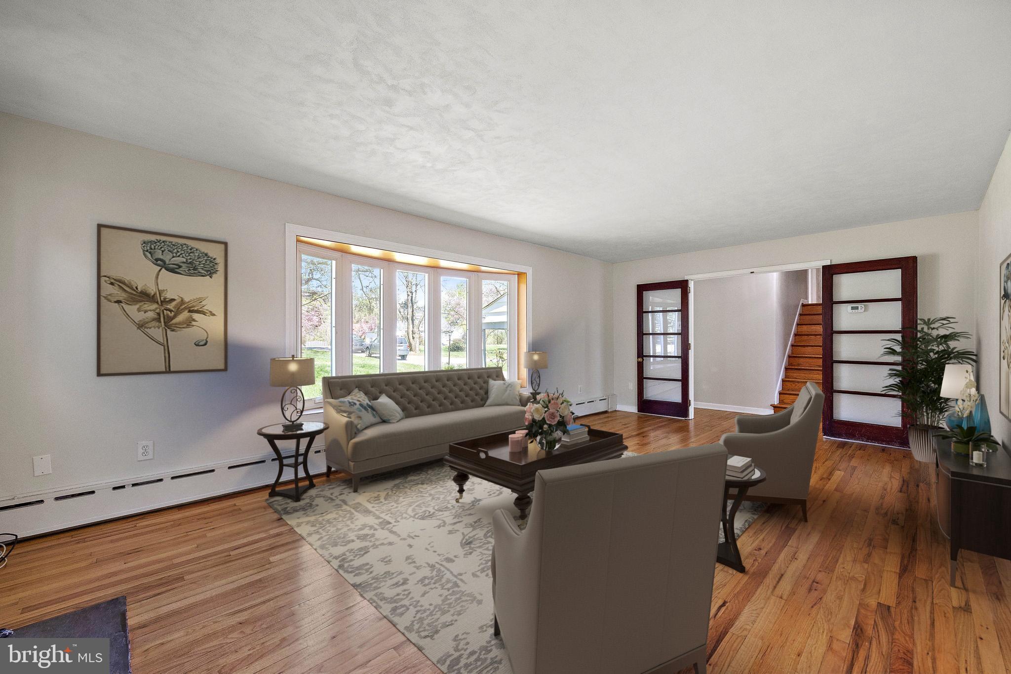 2324 West Chester Road Coatesville, PA 19320 - Photo 5 of 29 Virtually Staged Family Room