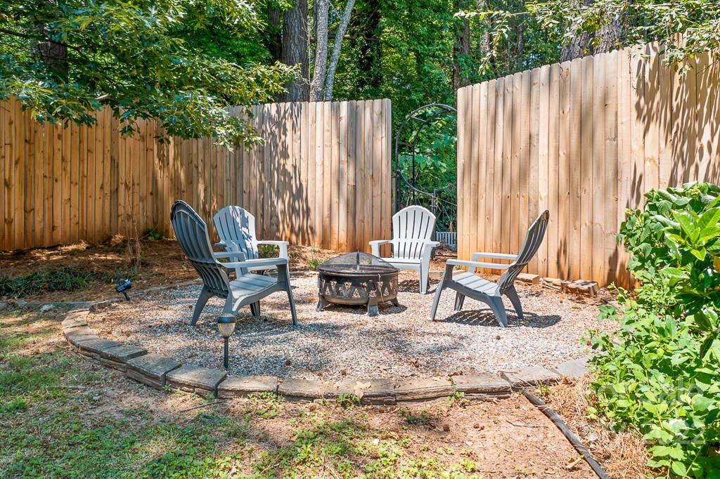 2981 Lake Shore Road South Denver, NC 28037 - Photo 21 of 28 a view of backyard with a table and chairs