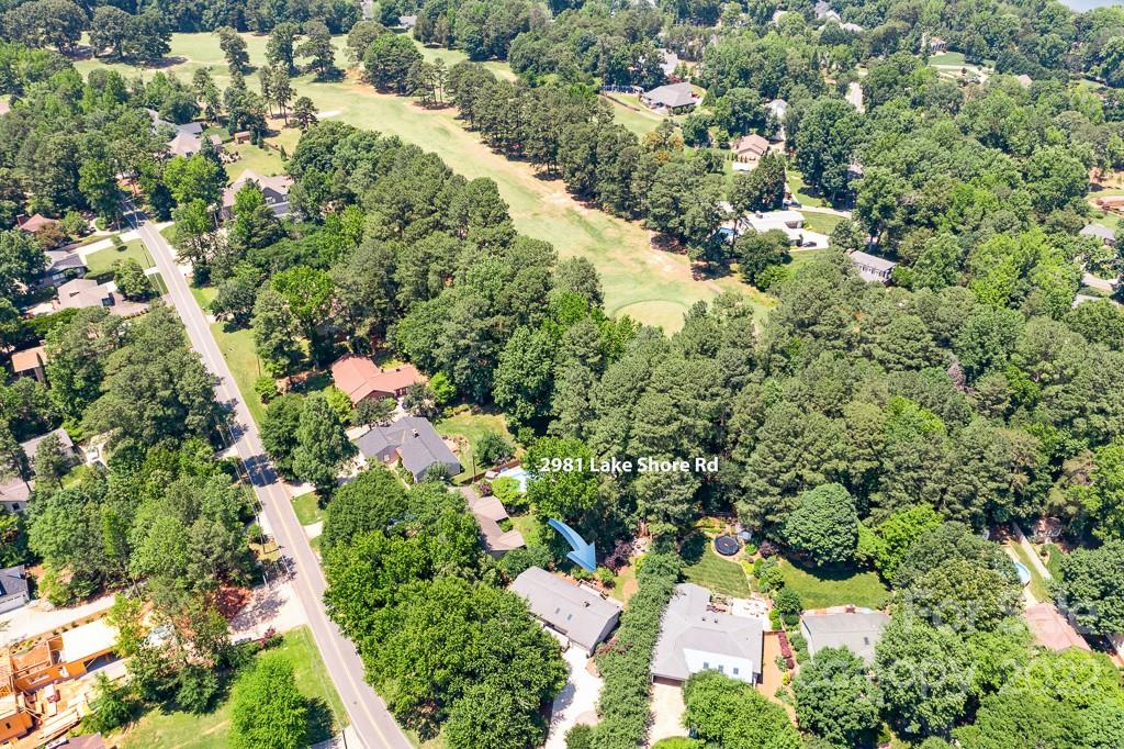 2981 Lake Shore Road South Denver, NC 28037 - Photo 4 of 28 an aerial view of a houses with yard
