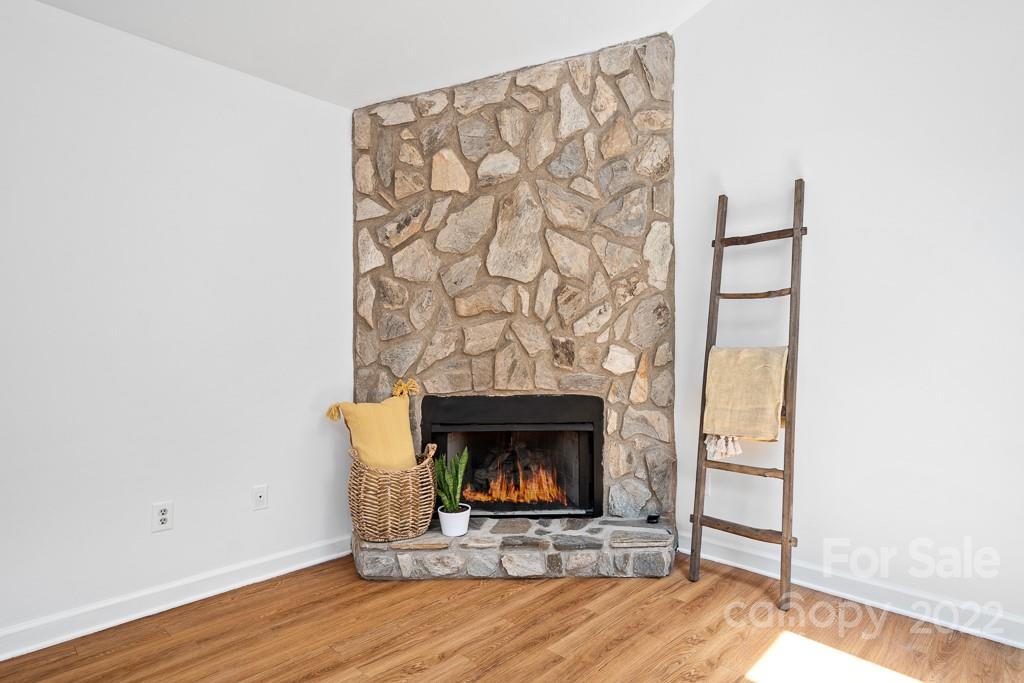 2981 Lake Shore Road South Denver, NC 28037 - Photo 7 of 28 a living room with a fireplace