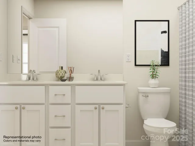 a large white bed in a white room