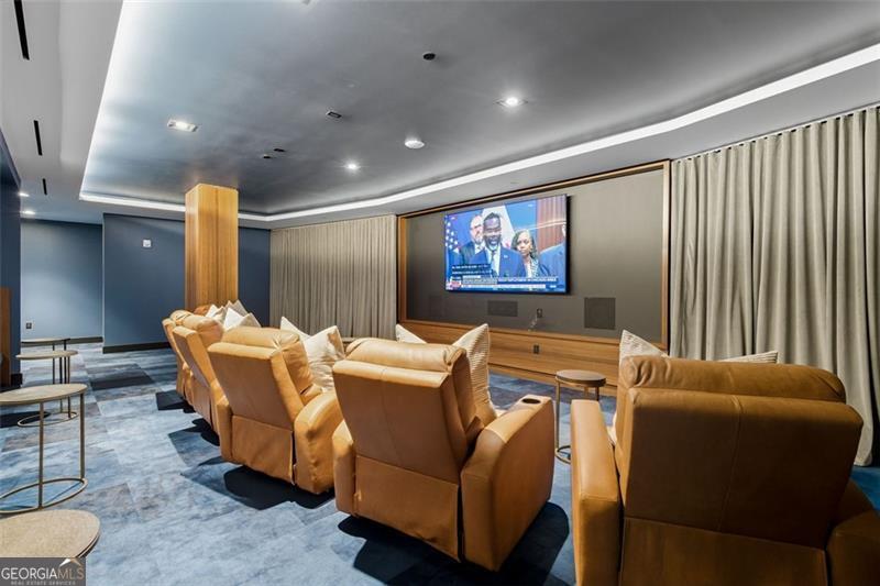 2425 Peachtree Road, Unit 1504 Atlanta, GA 30305 - Photo 55 of 66 a living room with furniture and a flat screen tv