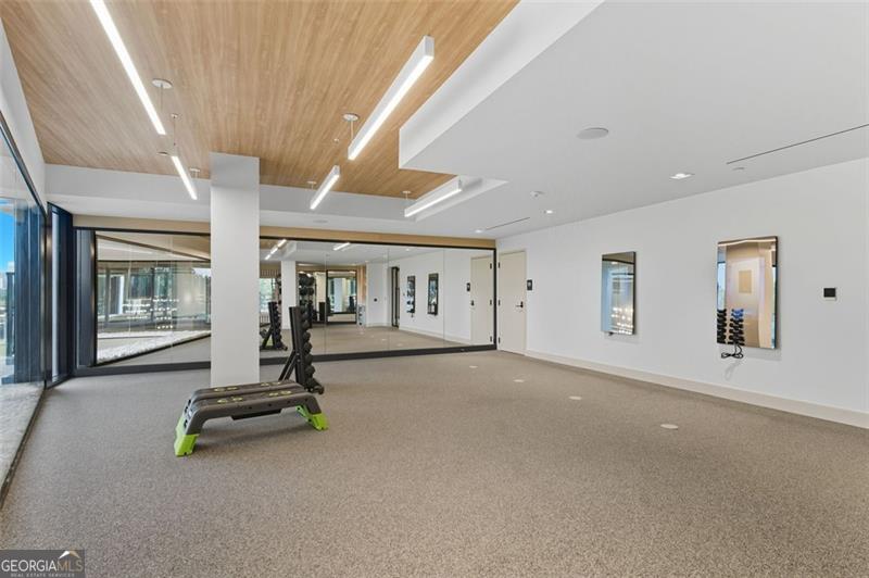 2425 Peachtree Road, Unit 1504 Atlanta, GA 30305 - Photo 58 of 66 a view of a room with gym equipment
