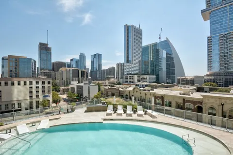 a view of a city with tall buildings