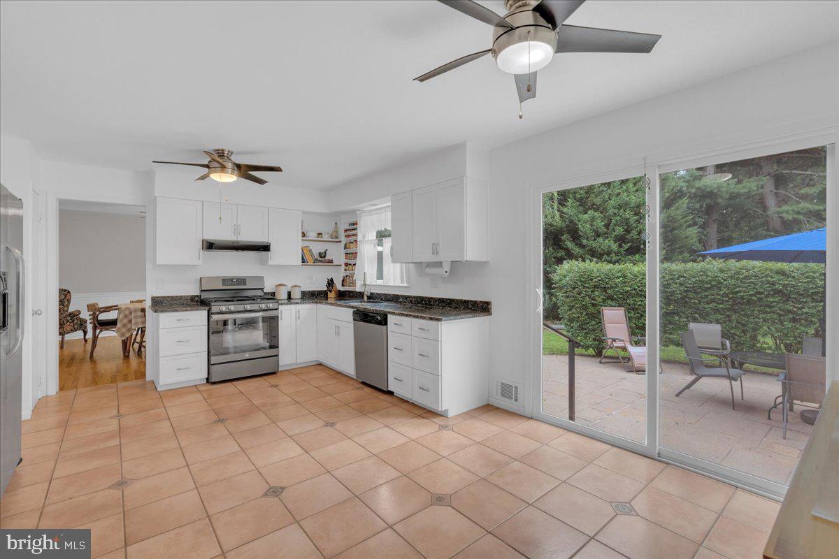 298 North Post Road Princeton Junction, NJ 08550 - Photo 11 of 35 a kitchen with a stove a sink and a refrigerator