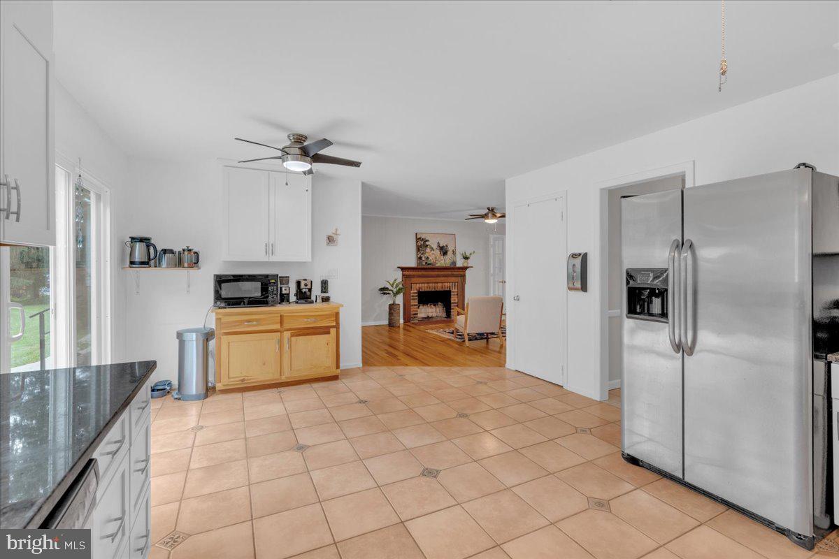 298 North Post Road Princeton Junction, NJ 08550 - Photo 13 of 35 a large kitchen with cabinets and stainless steel appliances