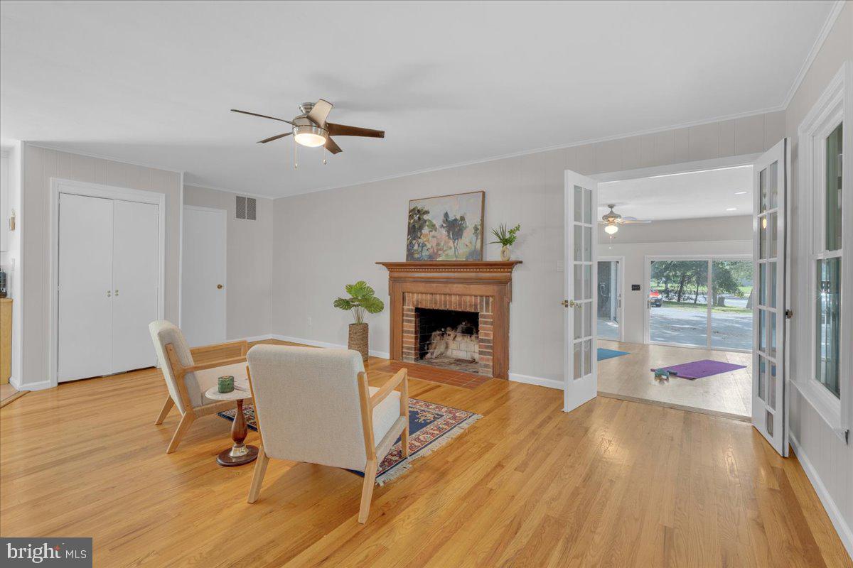 298 North Post Road Princeton Junction, NJ 08550 - Photo 14 of 35 a living room with furniture and a fireplace