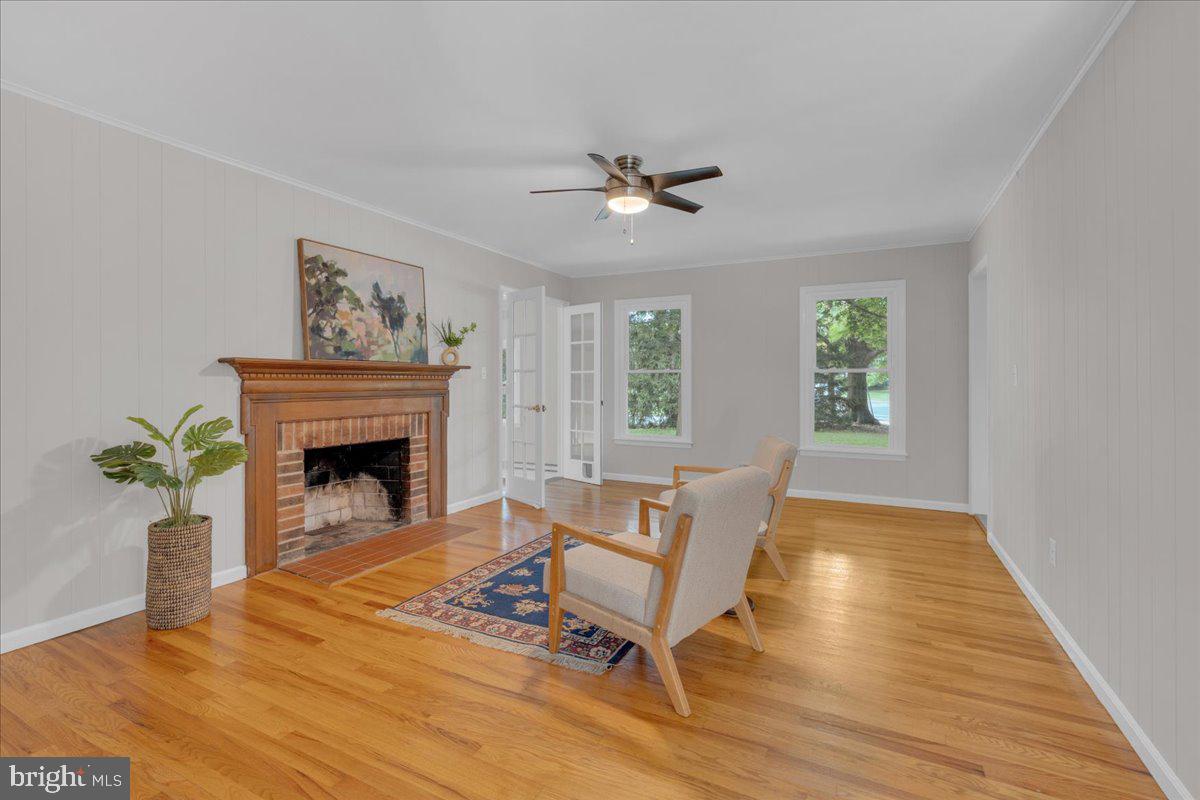 298 North Post Road Princeton Junction, NJ 08550 - Photo 15 of 35 a living room with furniture and a fireplace