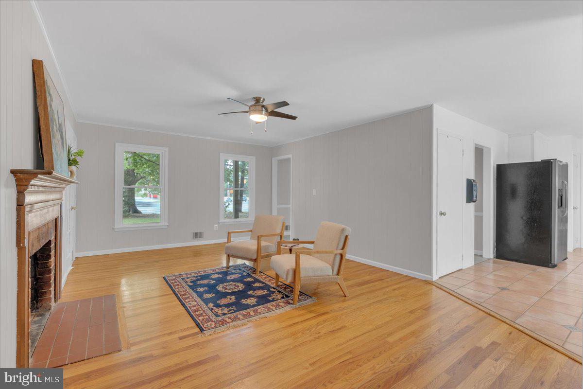 298 North Post Road Princeton Junction, NJ 08550 - Photo 16 of 35 a living room with furniture and a fireplace
