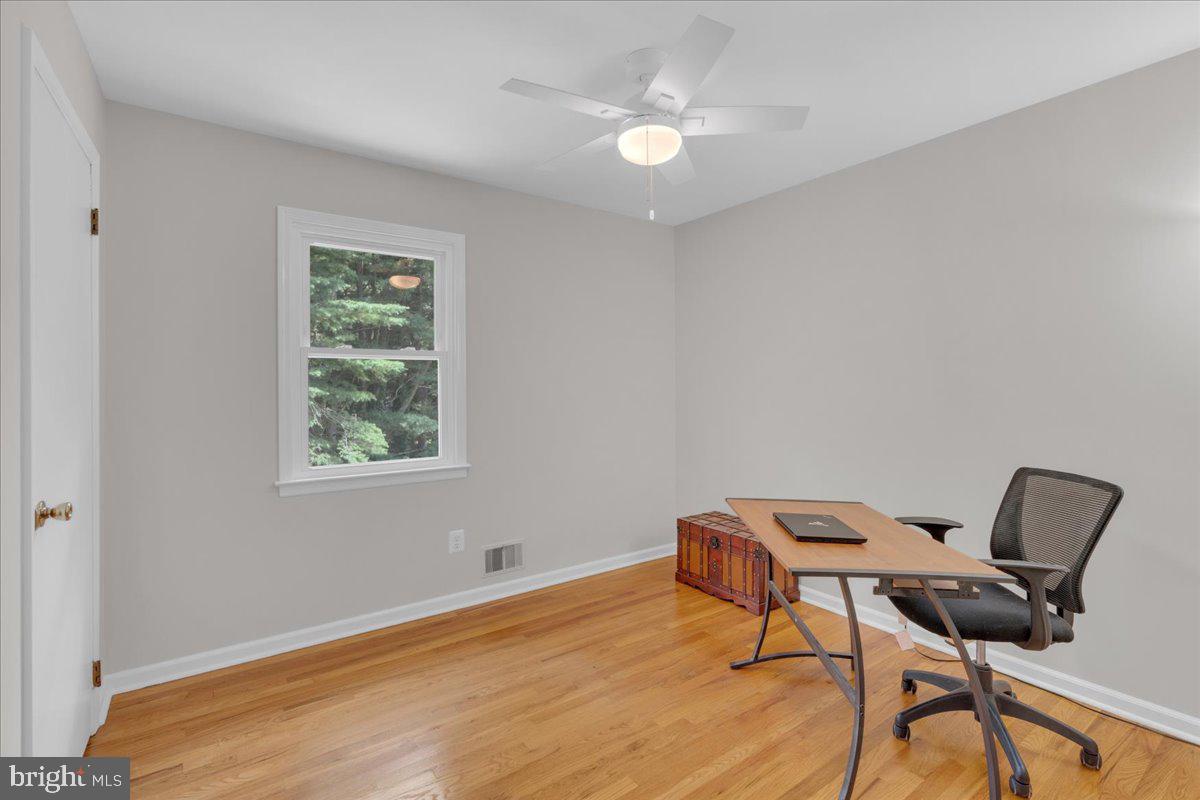 298 North Post Road Princeton Junction, NJ 08550 - Photo 21 of 35 a workspace room with a wooden floor and a window