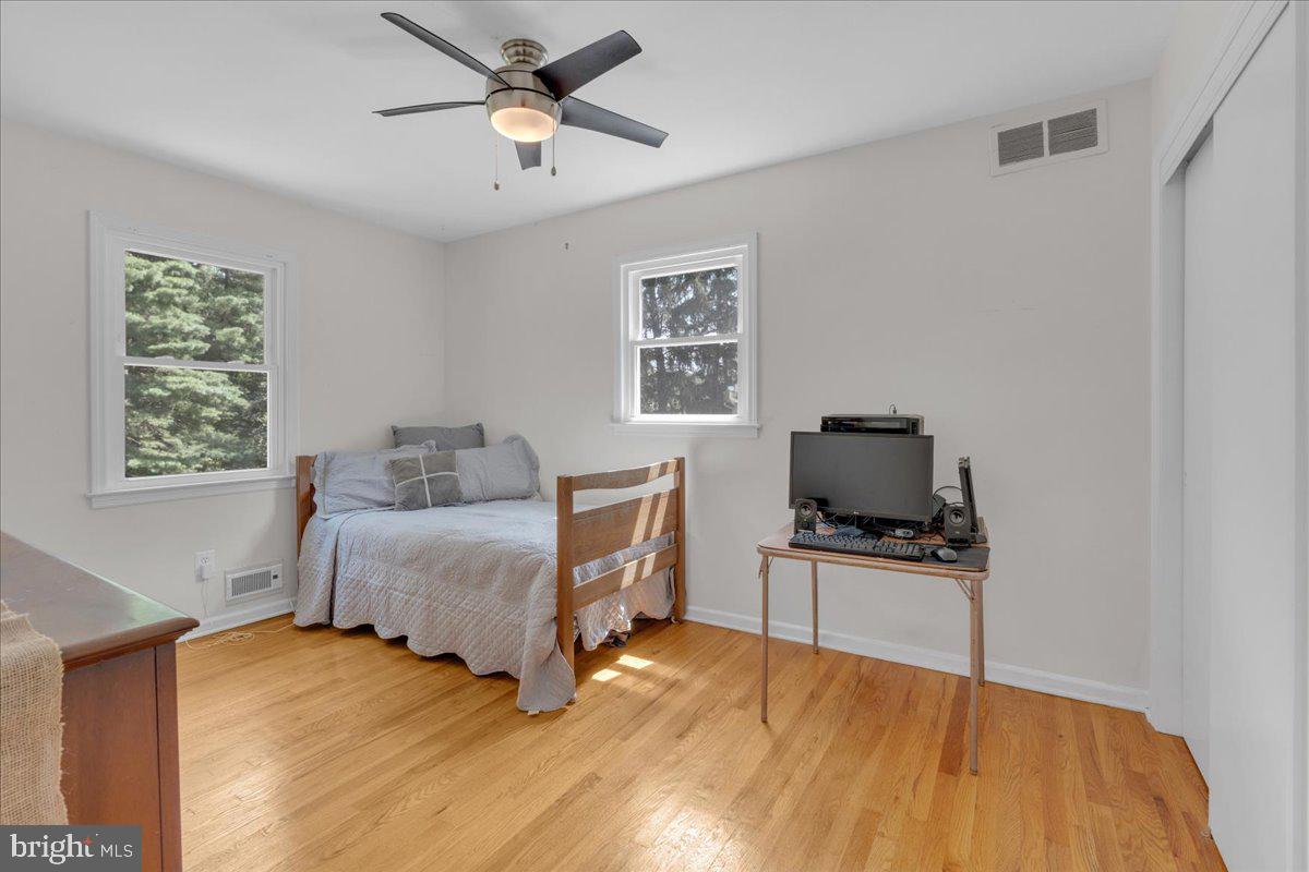 298 North Post Road Princeton Junction, NJ 08550 - Photo 23 of 35 a bedroom with a bed and a flat screen tv