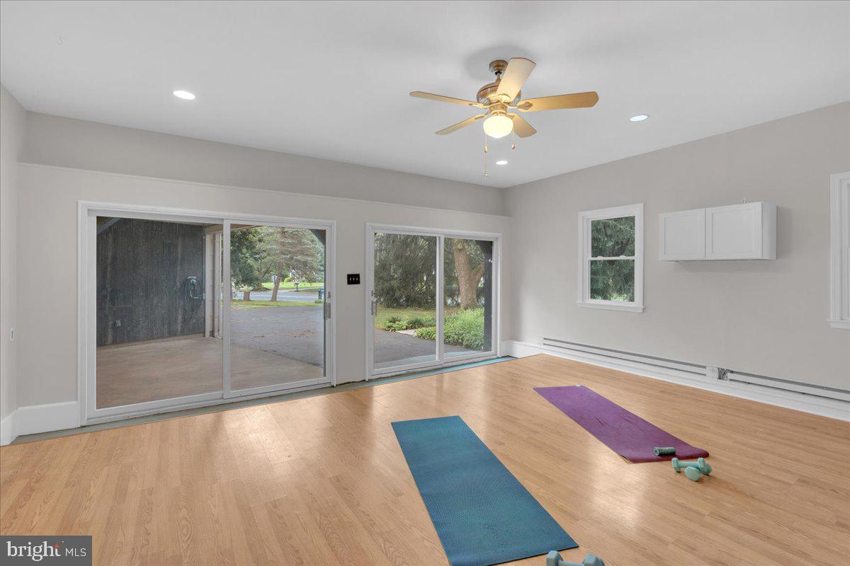 298 North Post Road Princeton Junction, NJ 08550 - Photo 27 of 35 a view of an empty room with window and wooden floor