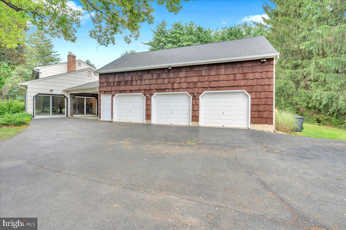 298 North Post Road Princeton Junction, NJ 08550 - Photo 4 of 35 a front view of a house with a yard and garage