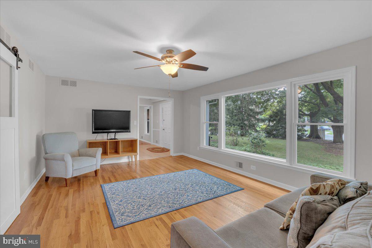 298 North Post Road Princeton Junction, NJ 08550 - Photo 8 of 35 a living room with furniture and a flat screen tv