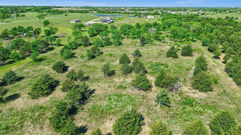 2554 Bennett Road Howe, TX 75459 - Photo 13 of 16 an aerial view of residential houses with outdoor space and trees