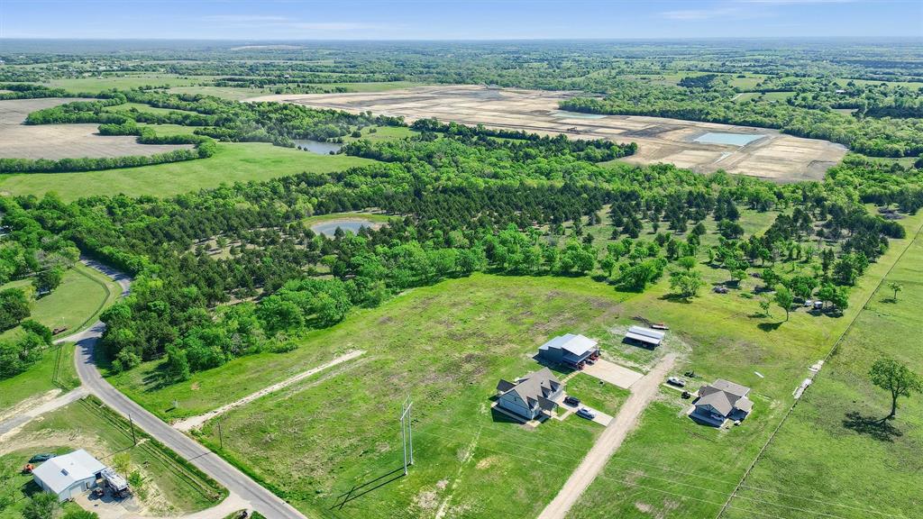 2554 Bennett Road Howe, TX 75459 - Photo 4 of 16 a view of a lush green field
