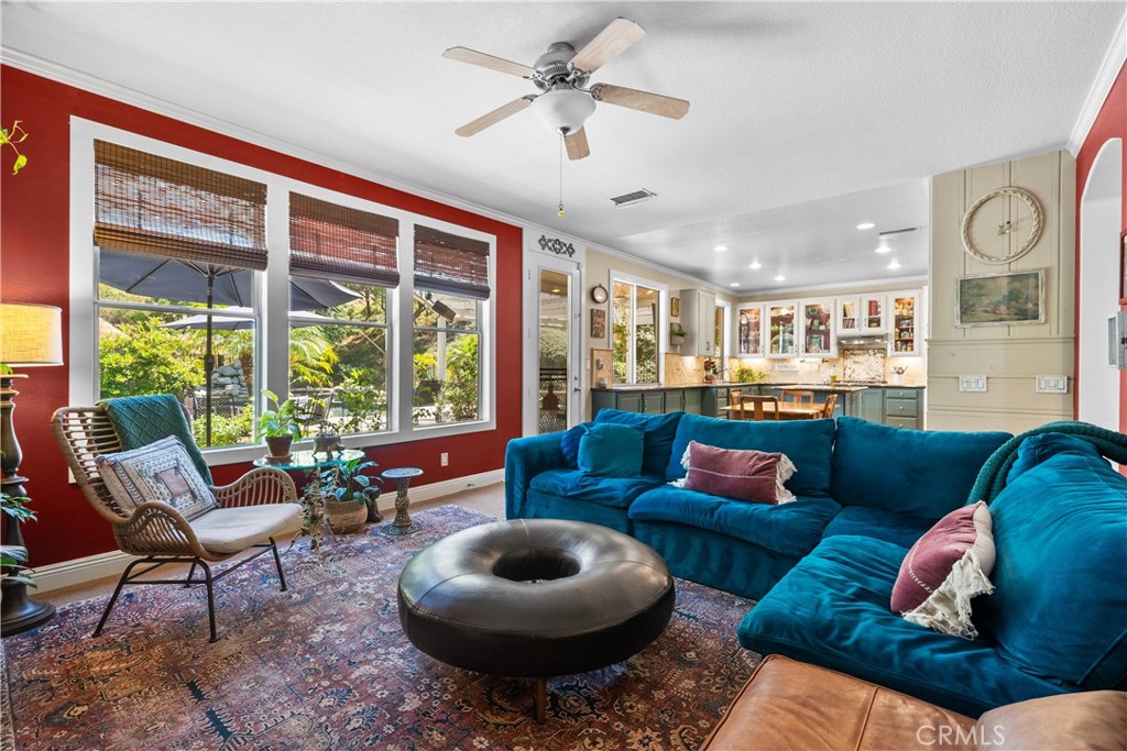 26214 Reade Place Stevenson Ranch, CA 91381 - Photo 17 of 58 a living room with furniture and a large window