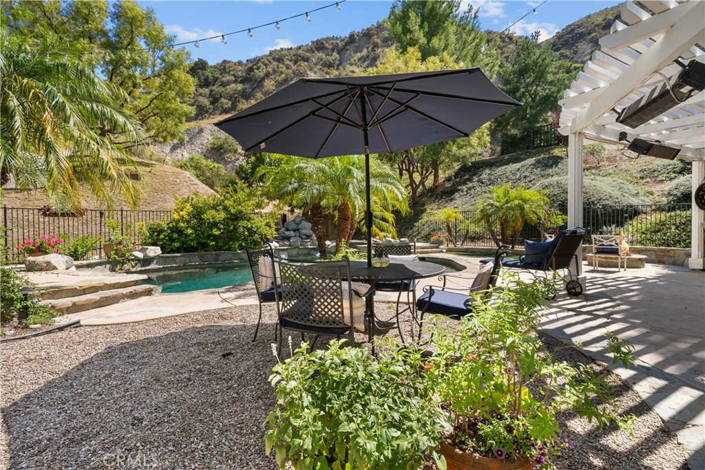 26214 Reade Place Stevenson Ranch, CA 91381 - Photo 24 of 58 a view of a sitting area with furniture and backyard