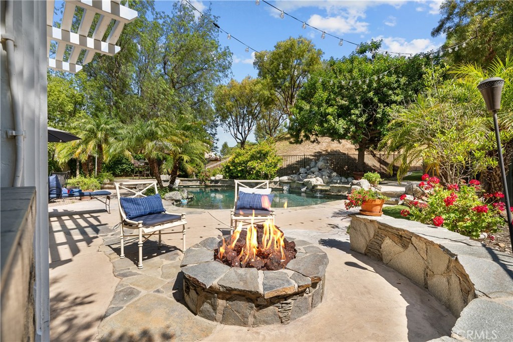 26214 Reade Place Stevenson Ranch, CA 91381 - Photo 26 of 58 a view of a chairs and table in a patio