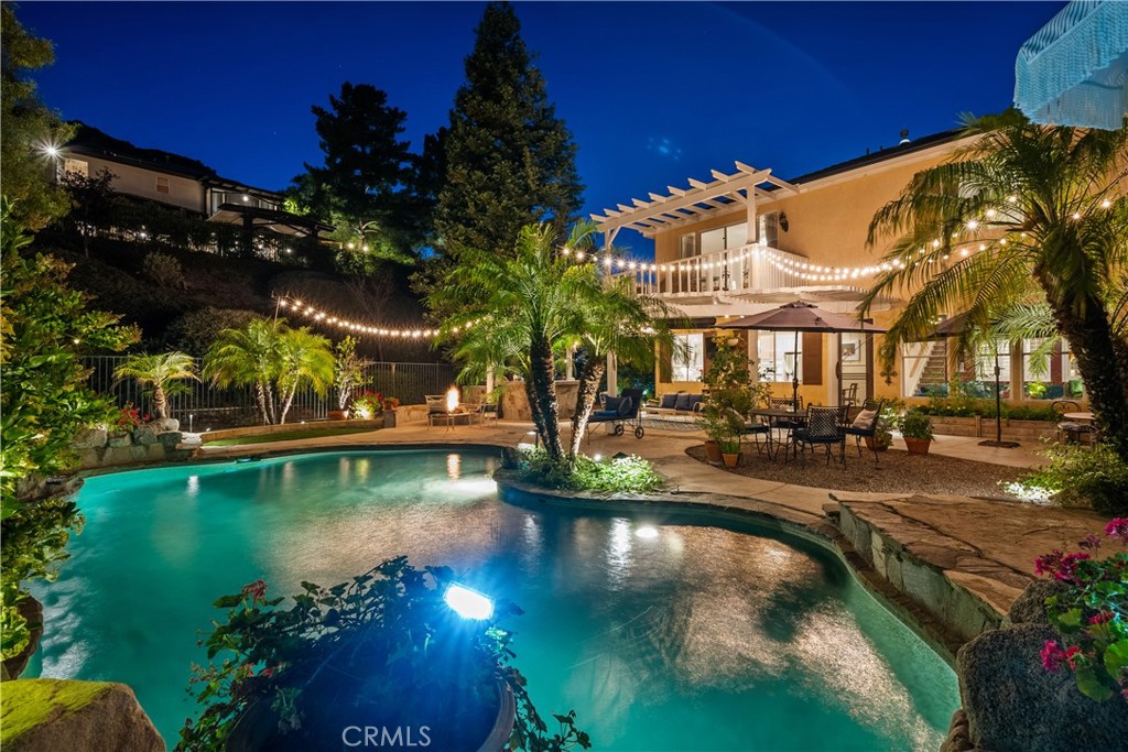 26214 Reade Place Stevenson Ranch, CA 91381 - Photo 3 of 58 a view of swimming pool with a yard