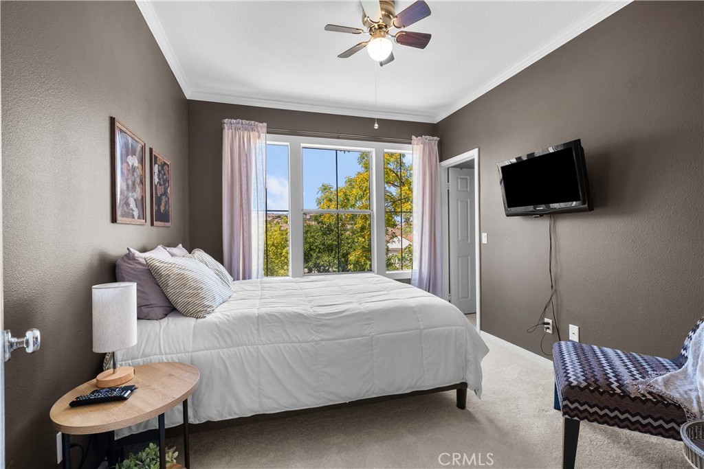 26214 Reade Place Stevenson Ranch, CA 91381 - Photo 37 of 58 a bedroom with a bed and a television