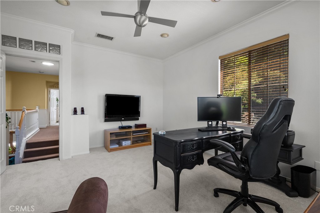26214 Reade Place Stevenson Ranch, CA 91381 - Photo 44 of 58 a view of a livingroom with workspace and a window