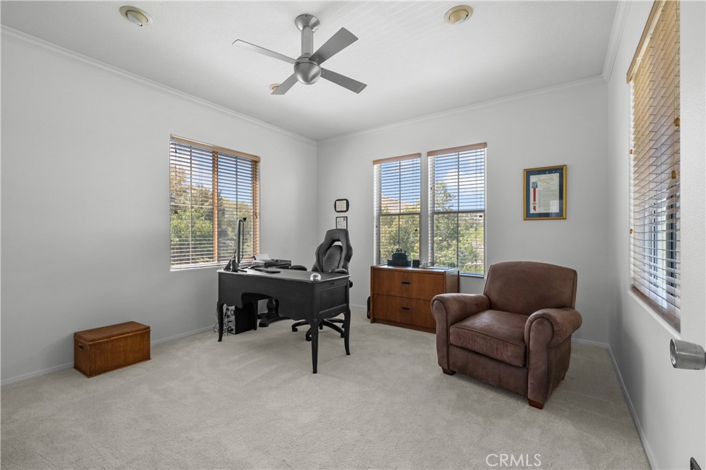 26214 Reade Place Stevenson Ranch, CA 91381 - Photo 45 of 58 a living room with furniture and a window