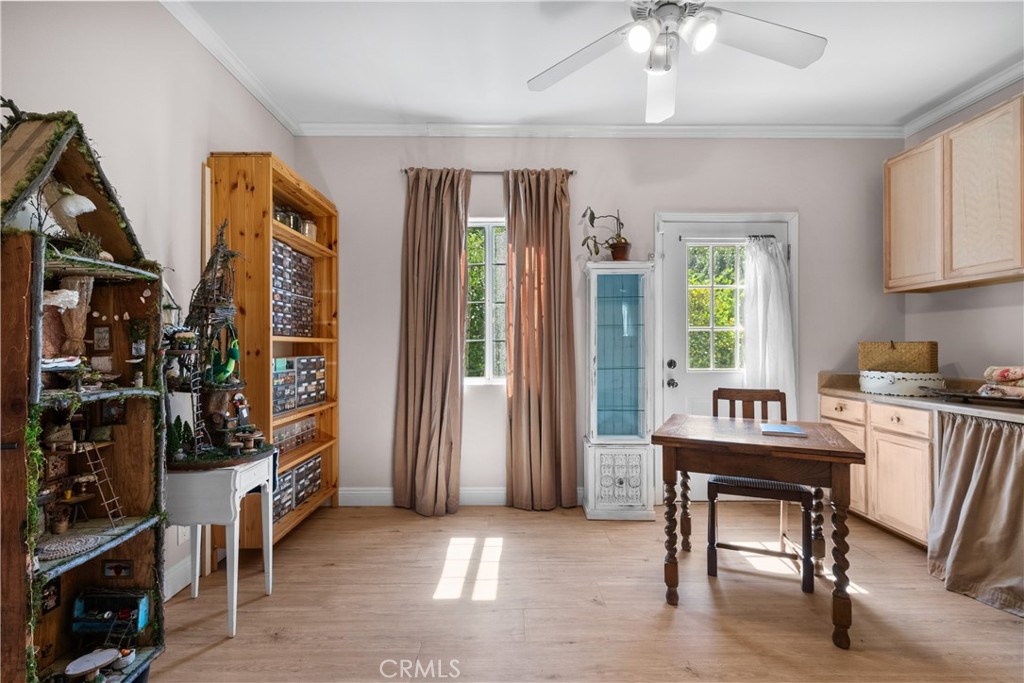 26214 Reade Place Stevenson Ranch, CA 91381 - Photo 46 of 58 a view of a workspace with furniture and a window