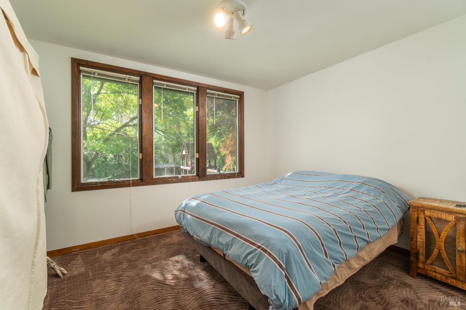 8 Circle Road San Rafael, CA 94903 - Photo 27 of 51 a bedroom with a bed and a window
