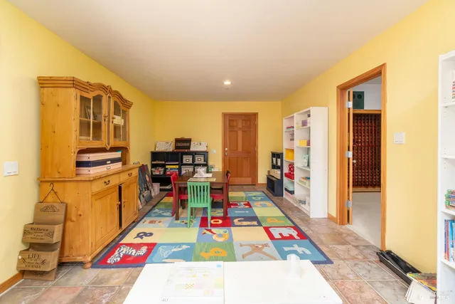 a room with musical instruments and air hockey table