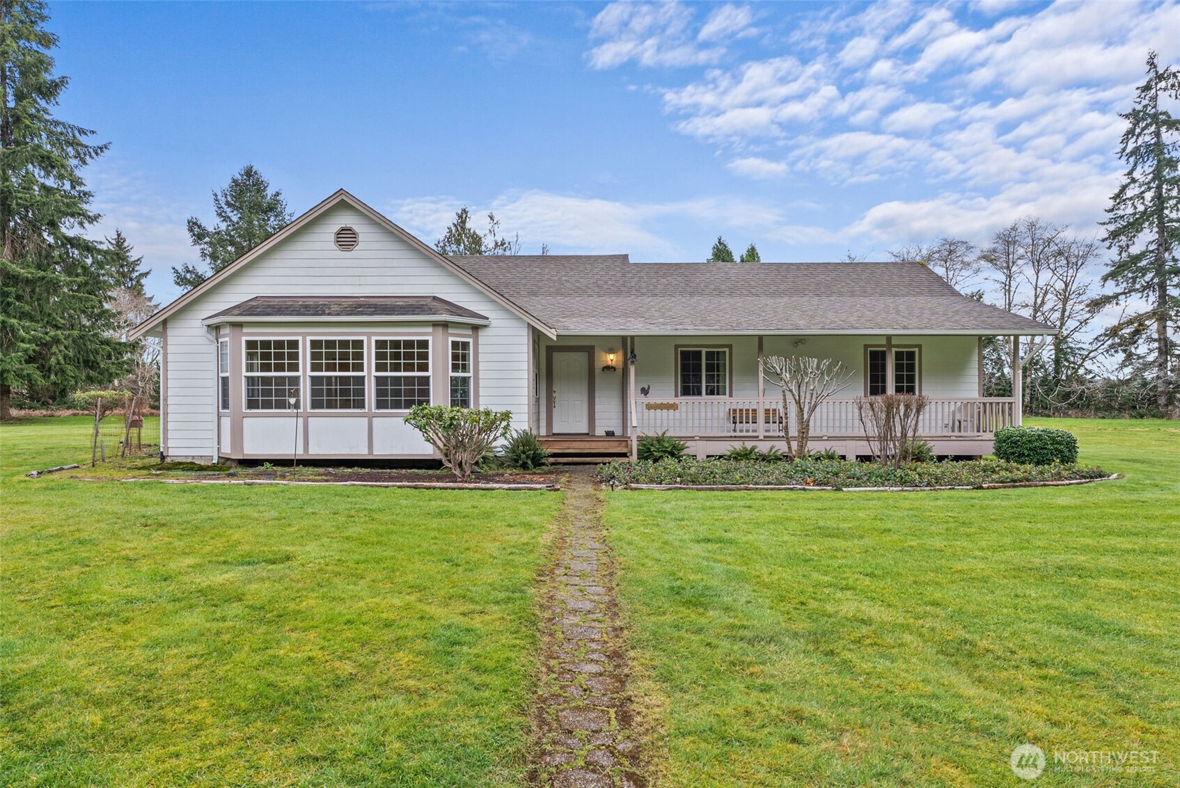 570 Wynoochee Valley Road Montesano, WA 98563 - Photo 1 of 28 a front view of a house with a garden