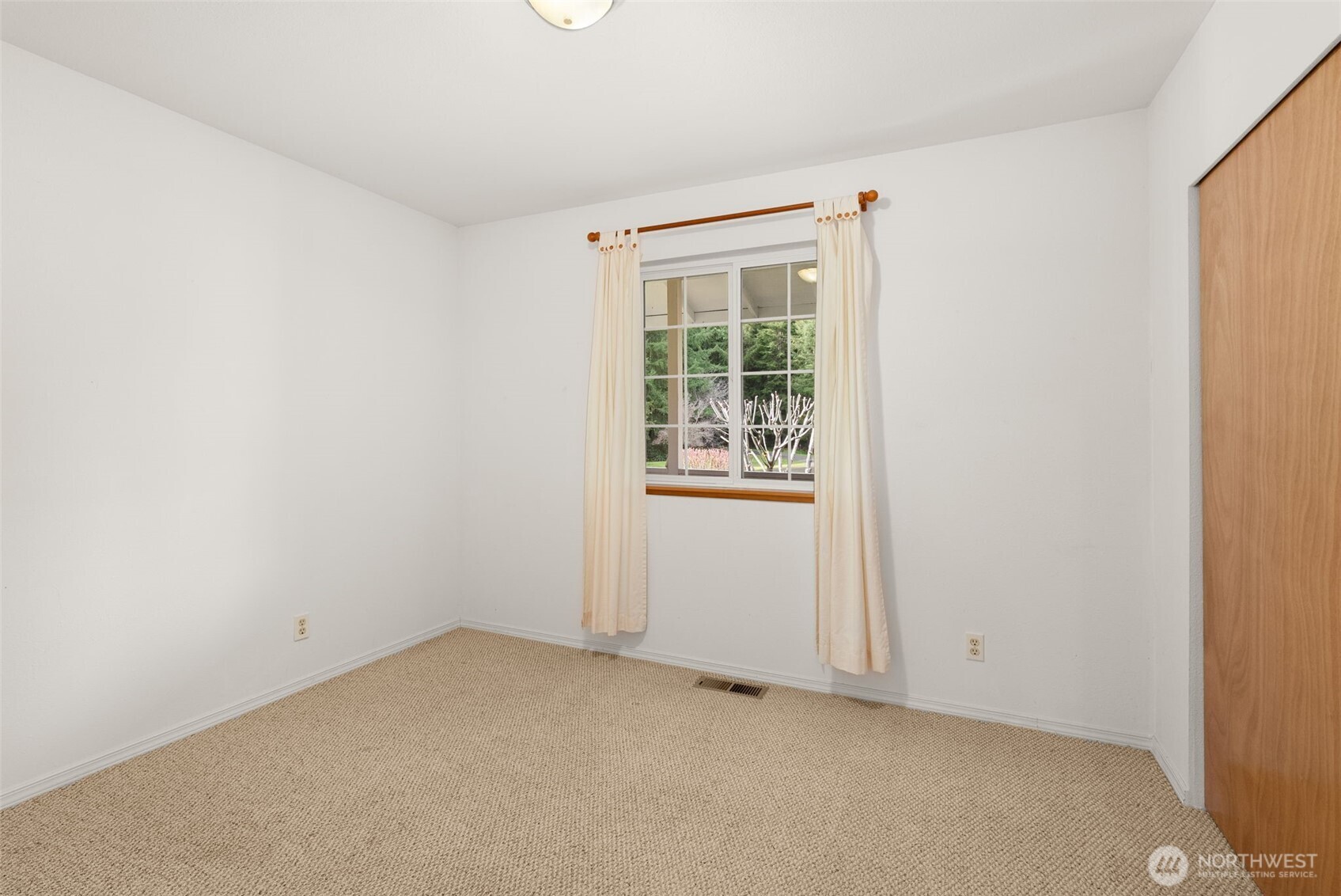 570 Wynoochee Valley Road Montesano, WA 98563 - Photo 15 of 28 an empty room with windows