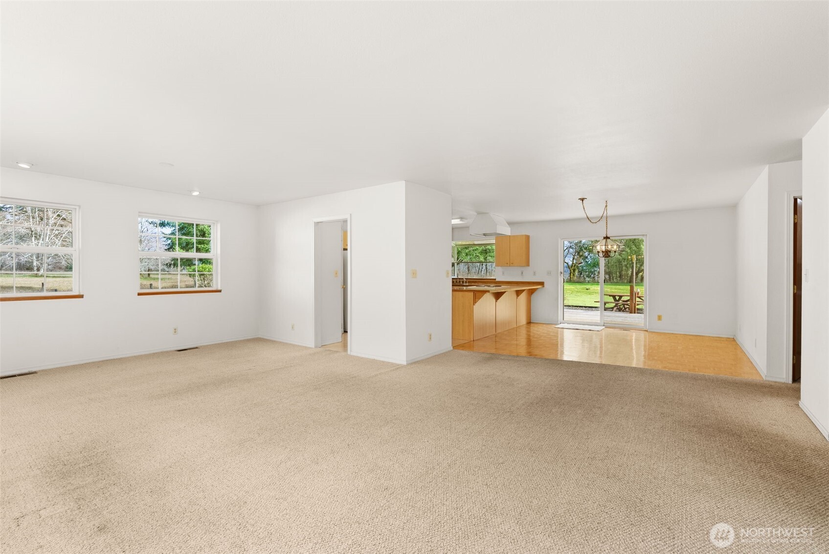 570 Wynoochee Valley Road Montesano, WA 98563 - Photo 4 of 28 a view of a kitchen with a sink cabinets and a window
