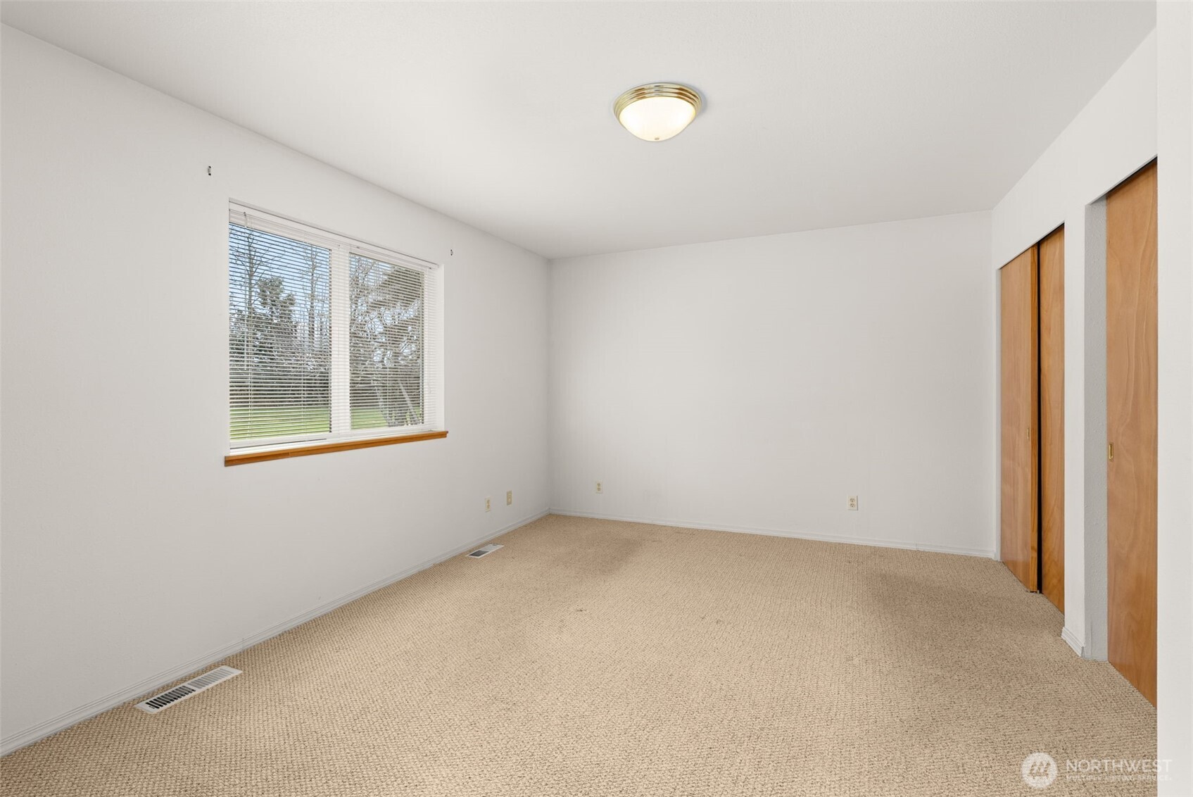 570 Wynoochee Valley Road Montesano, WA 98563 - Photo 10 of 28 an empty room with windows
