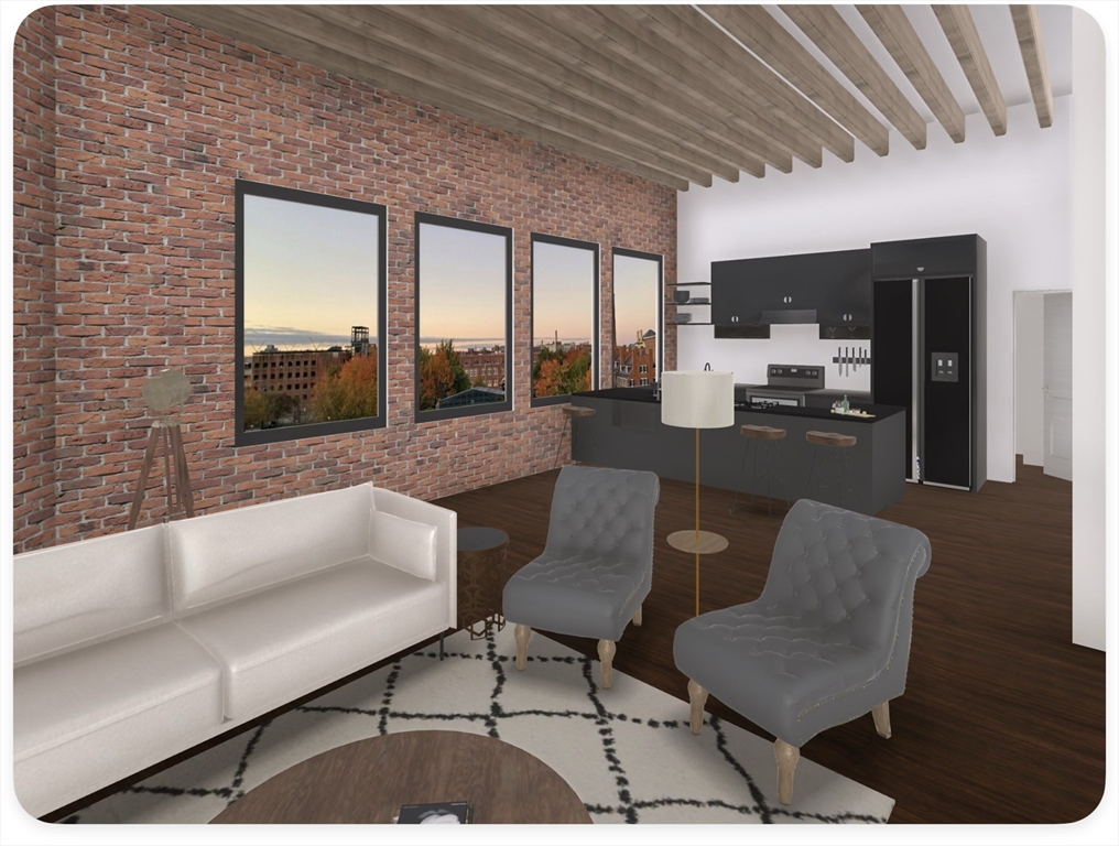 9 Central Street, Unit 602 Lowell, MA 01852 - Photo 1 of 14 a living room with furniture and a floor to ceiling window
