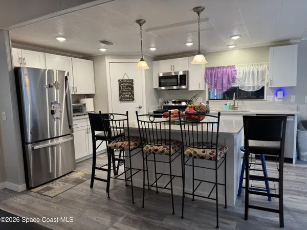 $210,000 | 915 Hemlock Street, Barefoot Bay, FL 32976