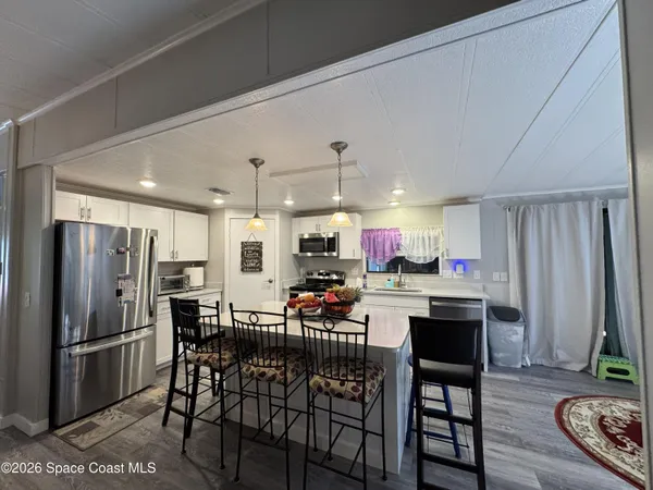 $210,000 | 915 Hemlock Street, Barefoot Bay, FL 32976