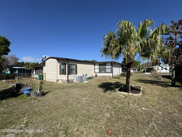 $210,000 | 915 Hemlock Street, Barefoot Bay, FL 32976