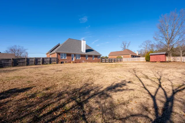 a view of house with outdoor space