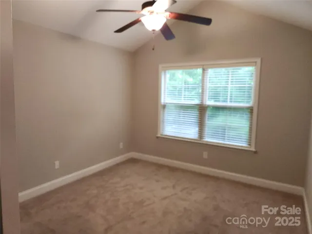 a bathroom with a shower and a shower