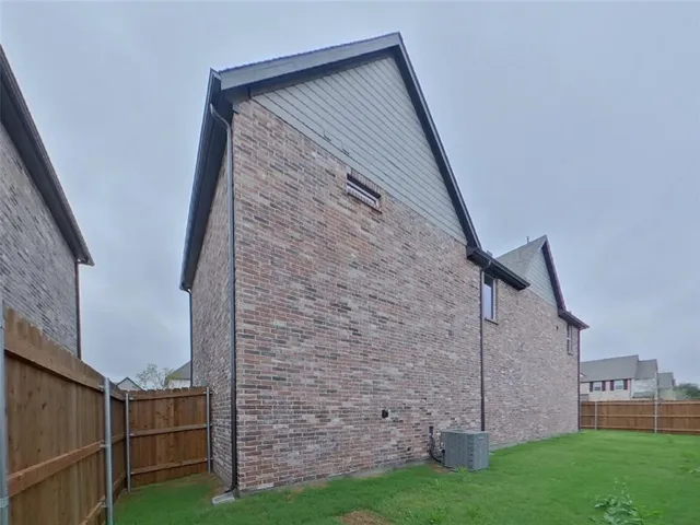 a view of an empty room with stairs