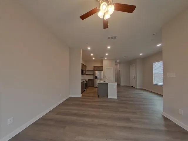 a view of a kitchen with a sink