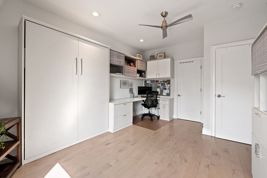 28 Atlantic Avenue, Unit 638 Boston, MA 02110 - Photo 24 of 39 a kitchen with stainless steel appliances a refrigerator sink and microwave