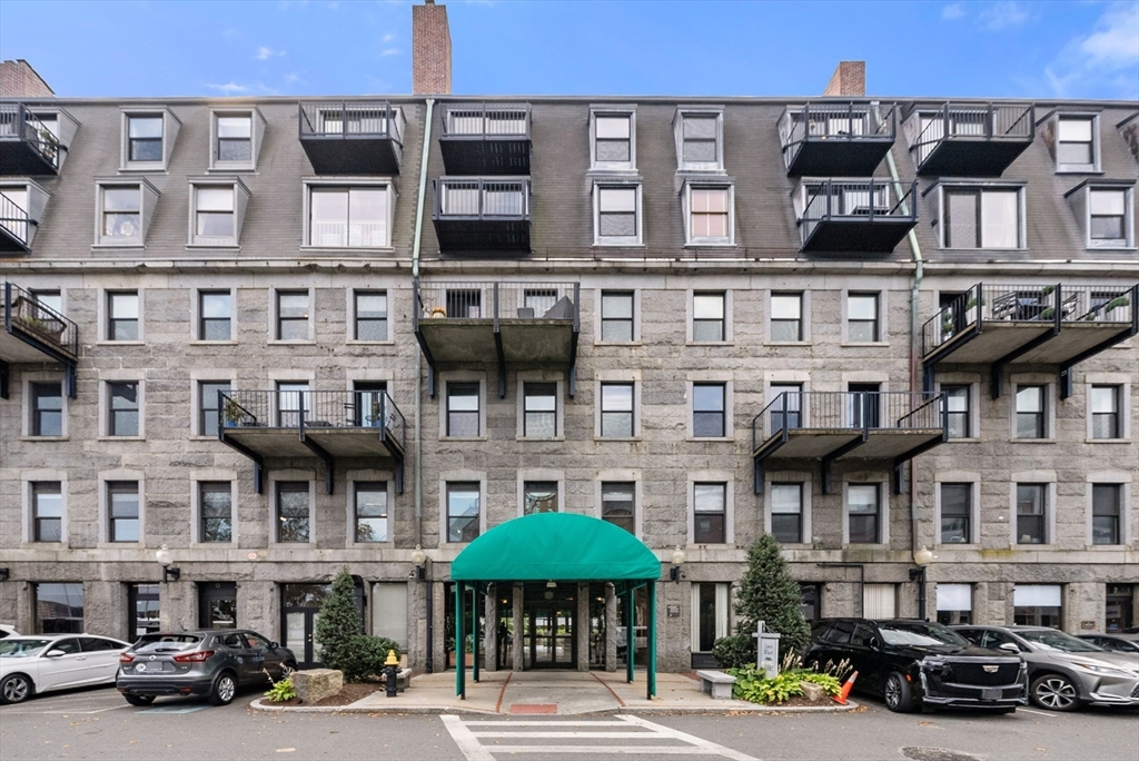 28 Atlantic Avenue, Unit 638 Boston, MA 02110 - Photo 37 of 39 a car parked in front of a building