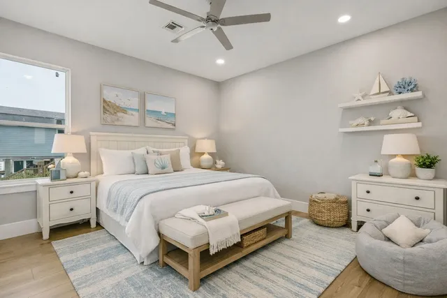 a bedroom with a bed and window