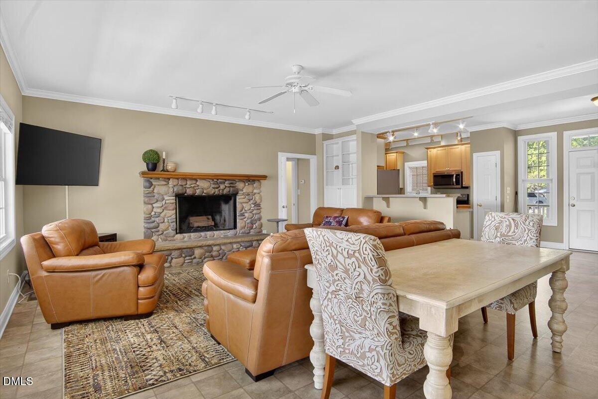 185 Joe Baldwin Road Leasburg, NC 27291 - Photo 12 of 95 a living room with furniture and a fireplace